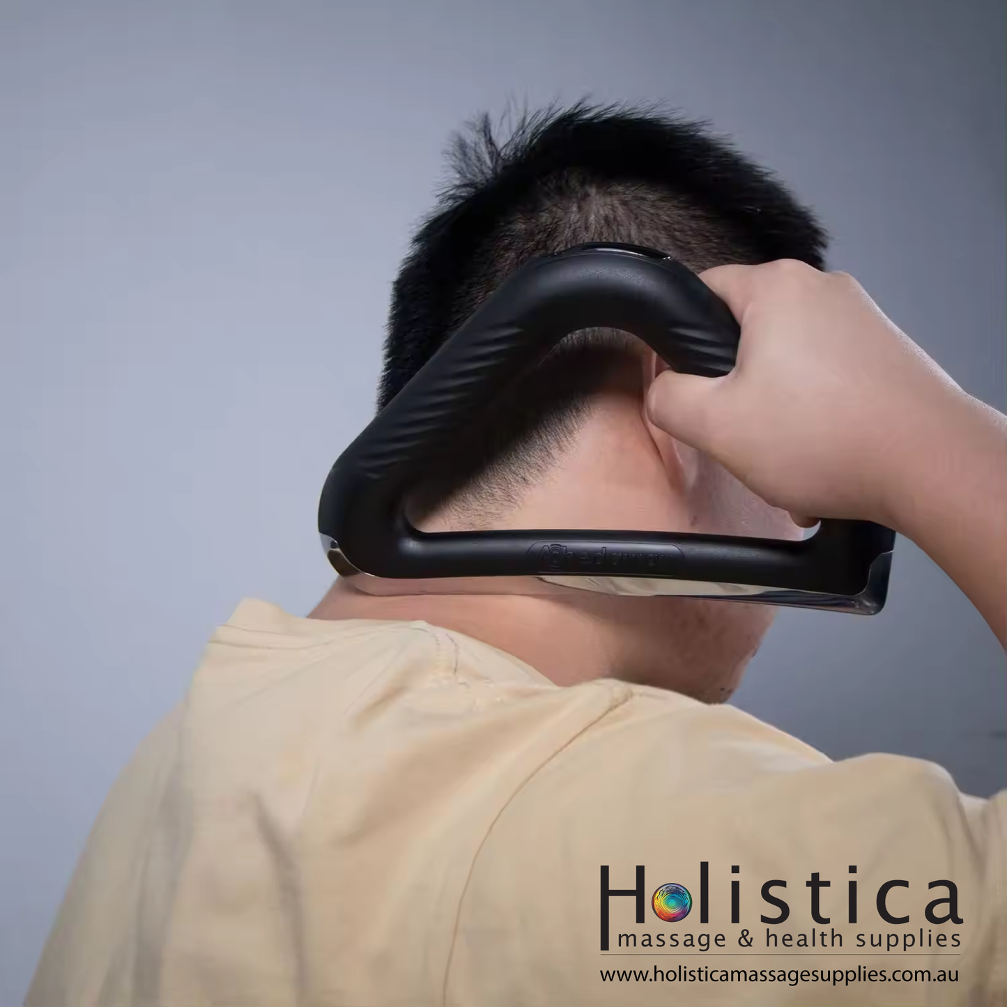 A person performing self massage with a heater scraper tool by Achedaway.